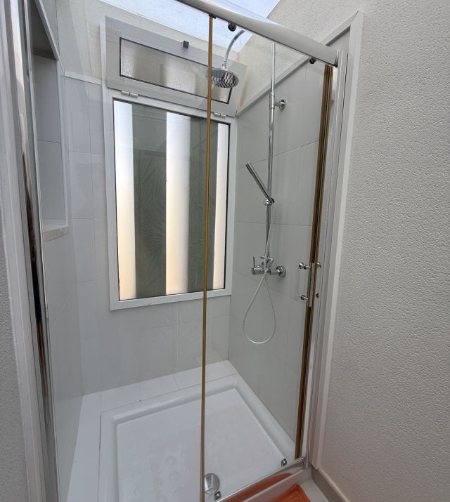 Resa Estates Ibiza longter rental Cala Tarida penthouse shower.jpeg